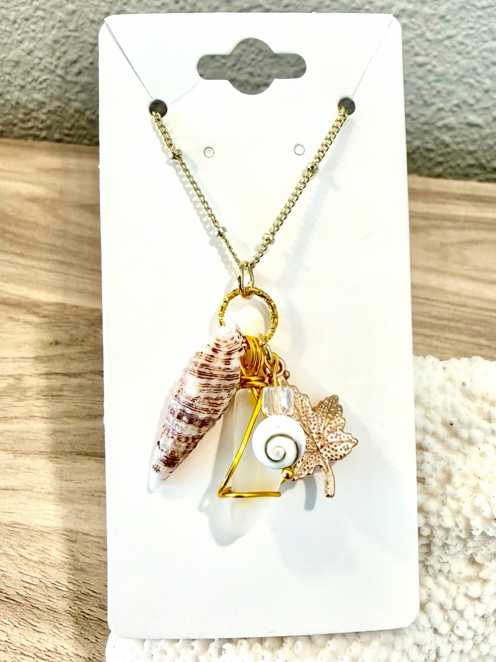 103. Gold-Tone Shell Charm Pendant Necklace with sea glass and shiva bead